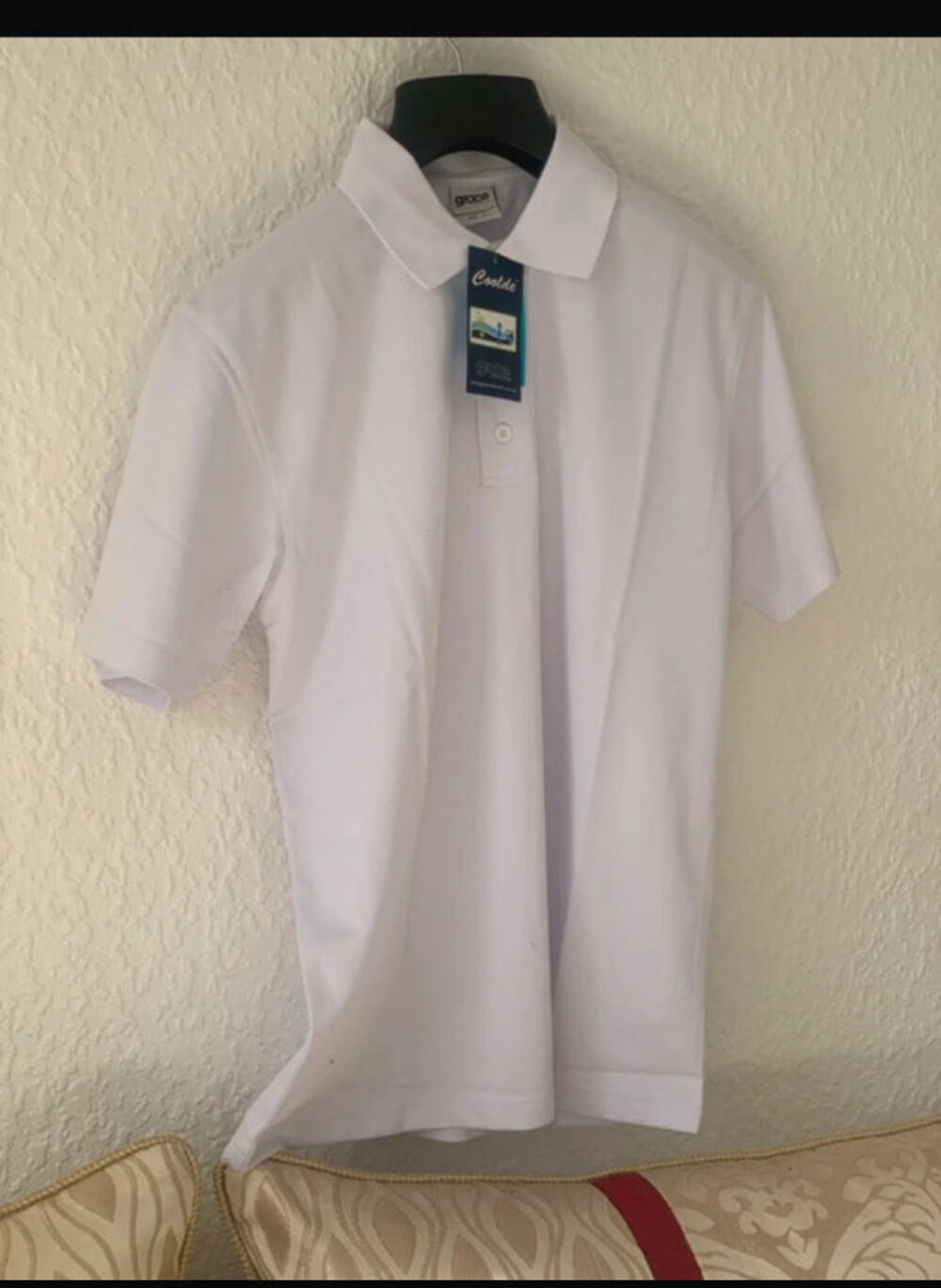 Polo blanc Marque Grace
Collection - Taille S Vêtements