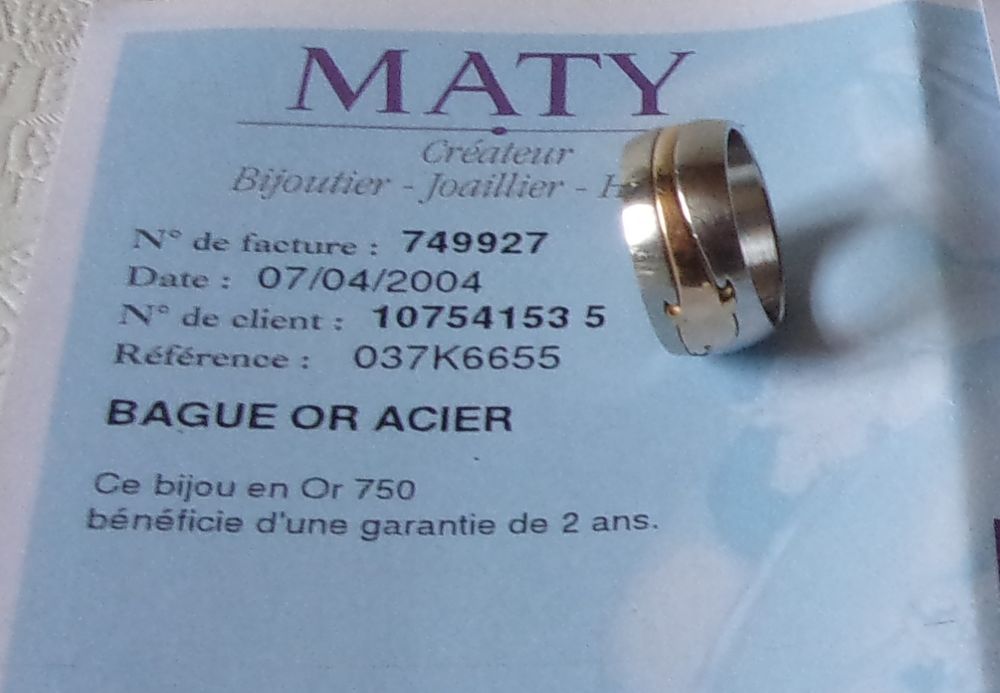 Bague OR 750 et ACIER Bijoux et montres