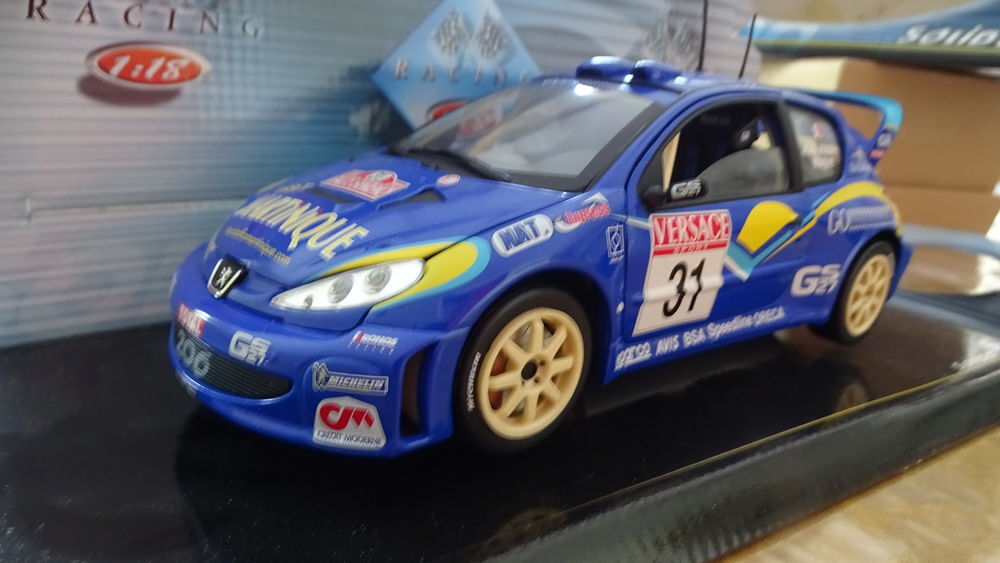 Miniatures 1/18 PEUGEOT 206 WRC de chez SOLIDO Jeux / jouets