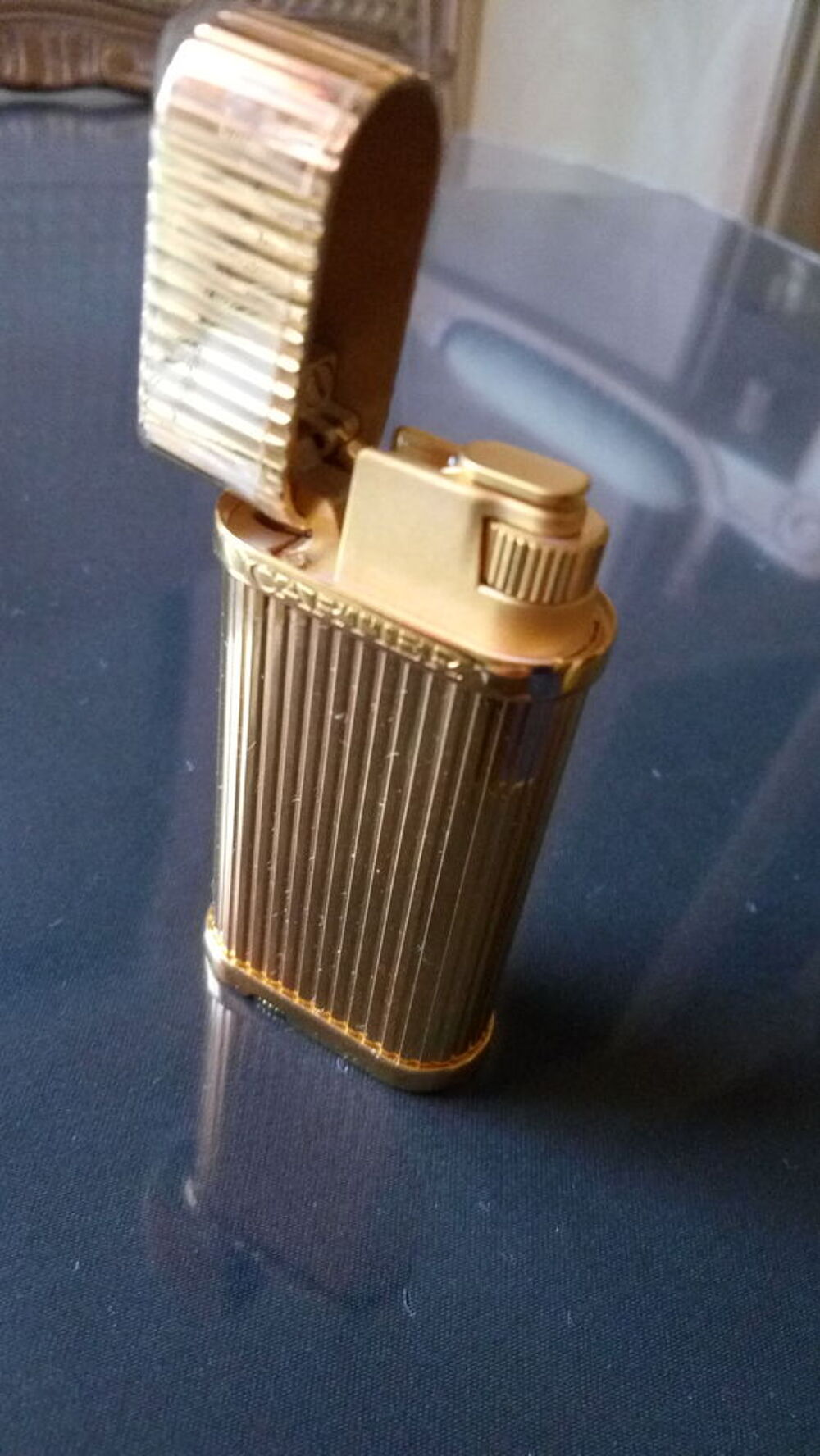 briquet luxe cartier Bijoux et montres