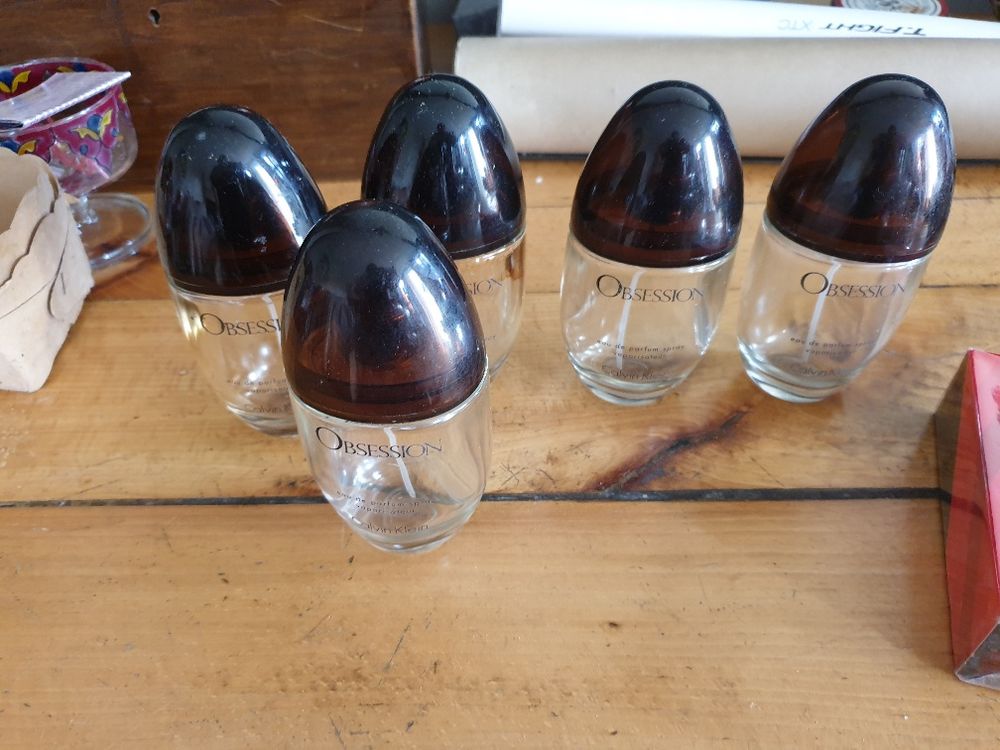 5 Flacons d'eau de parfum femme vide Obsession Calvin Klein 