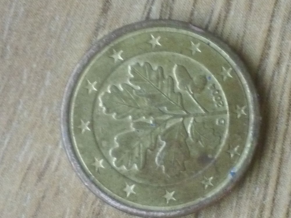 piece de1 euro cent.allemand 2004 D de couleur jaune tres ra 