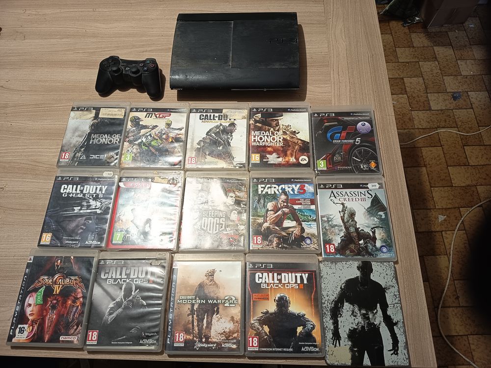 PS3 + jeux Consoles et jeux vidéos