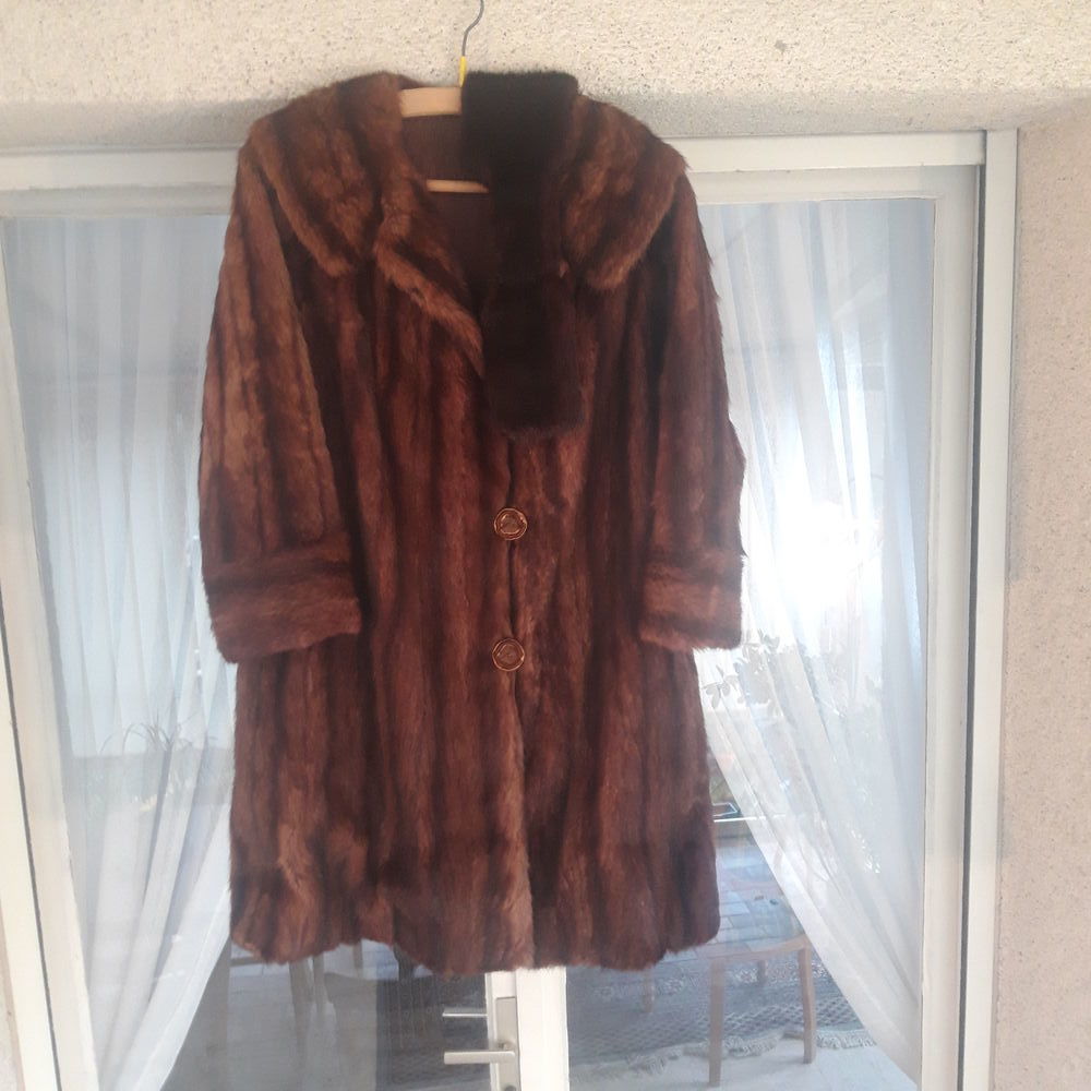 Manteau en vraie fourrure Vêtements