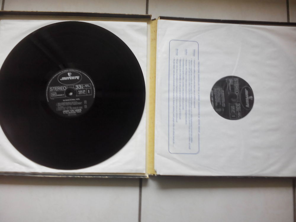Coffret de 4 vinyles 33t + livret de JERRY LEE LEWIS CD et vinyles