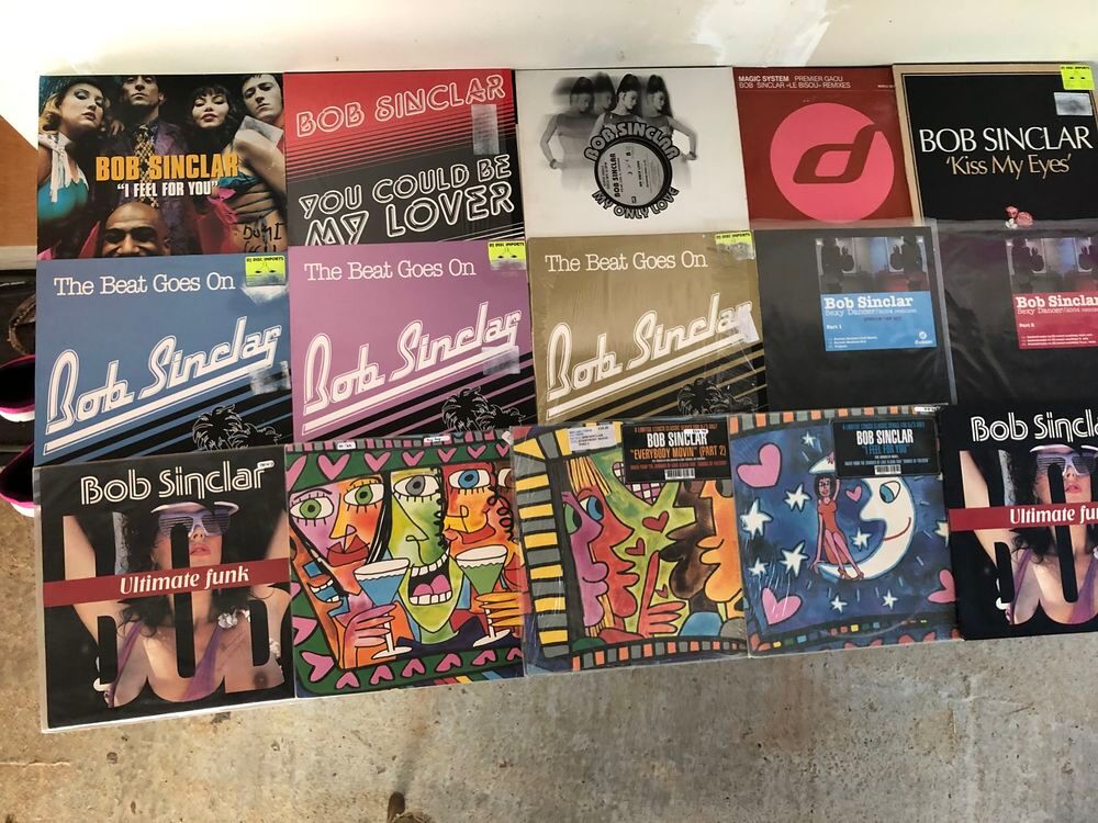 Lot de 2600 disques vinyles maxi 45 d'occasion . CD et vinyles