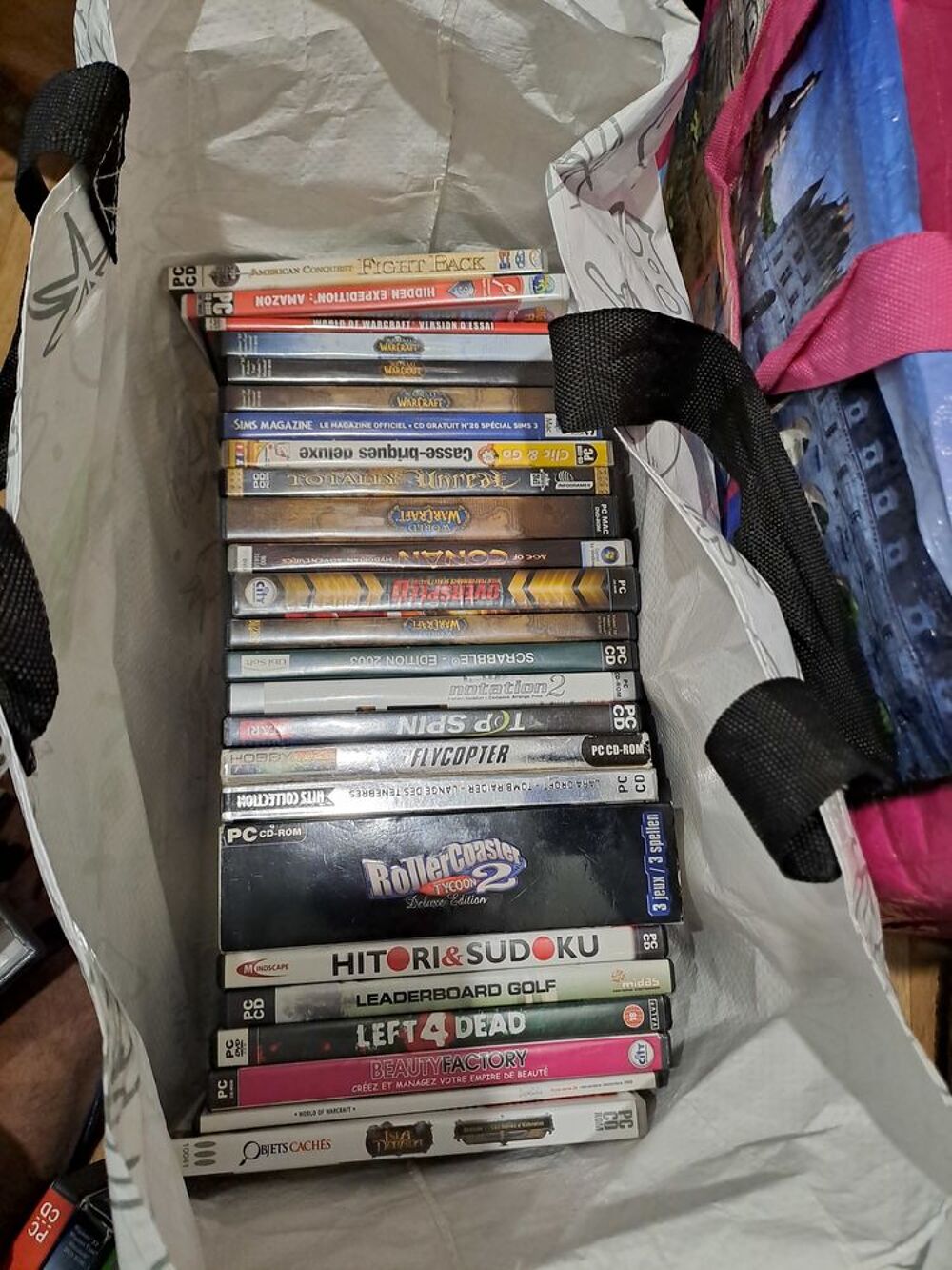 Lot de jeux pc-rom et dvd films Consoles et jeux vidéos