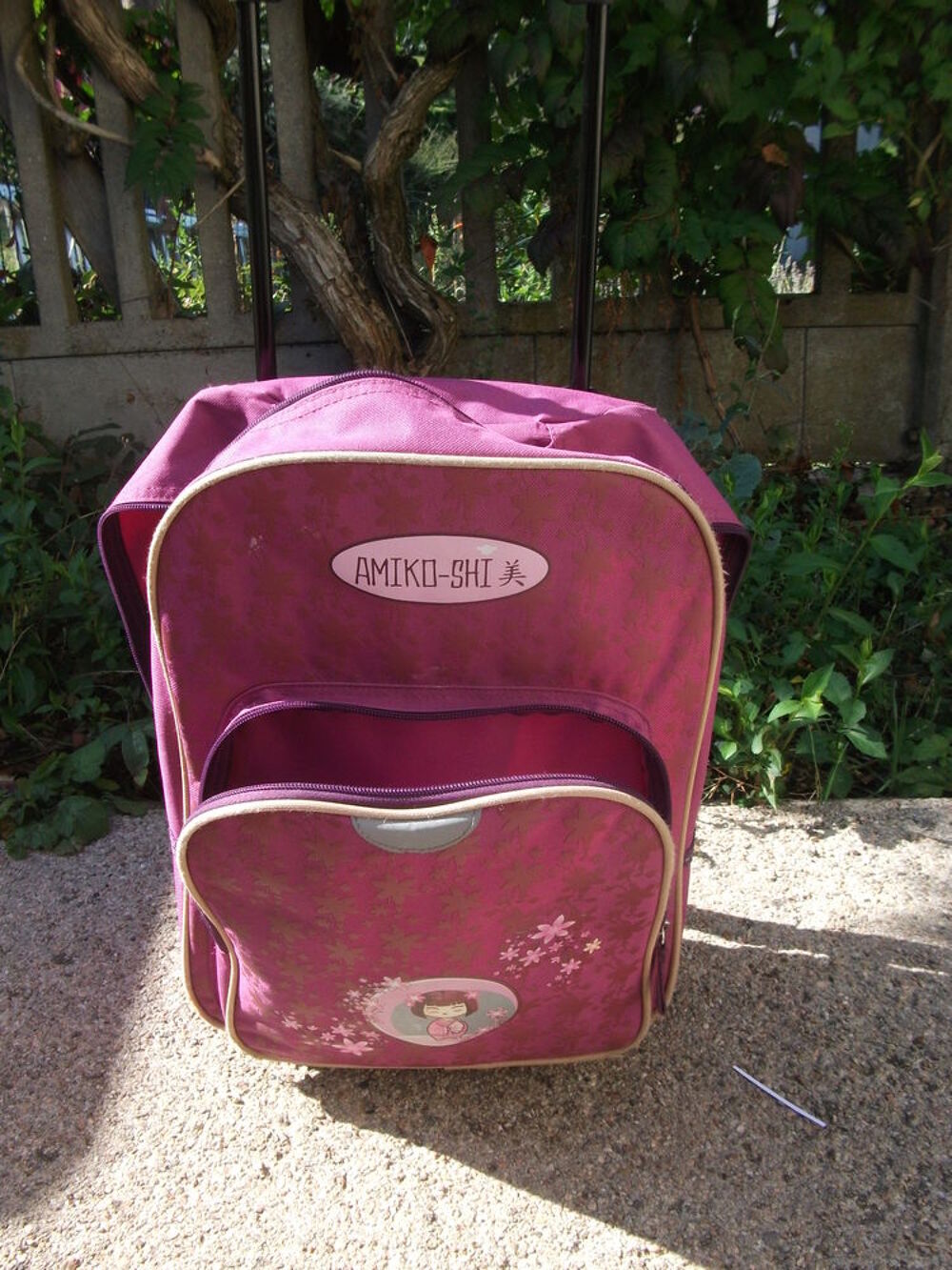 sac &agrave; dos &agrave; roulette de couleur violet prune Maroquinerie