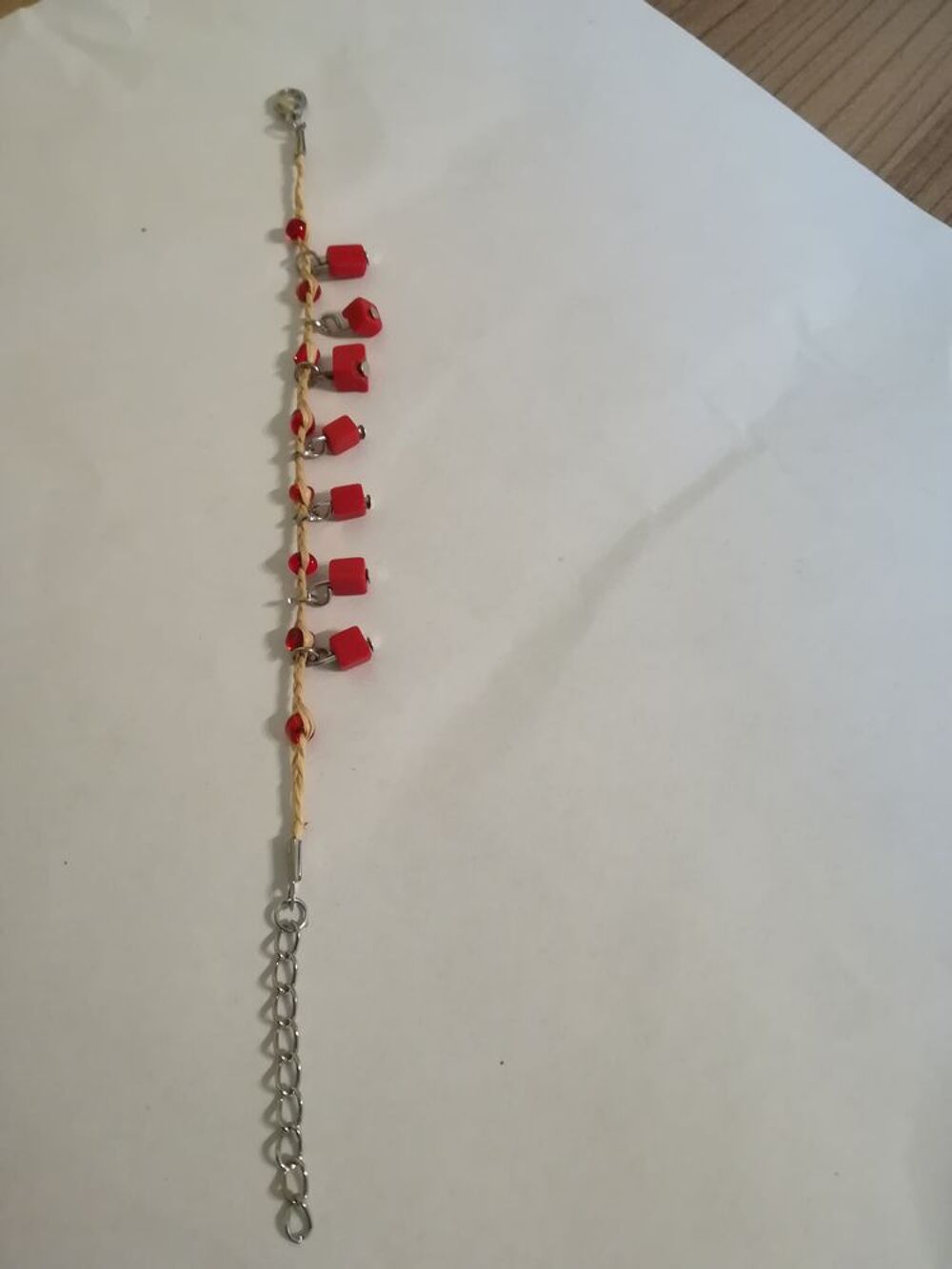 BRACELET FANTAISIE avec petits cubes orange
Bijoux et montres