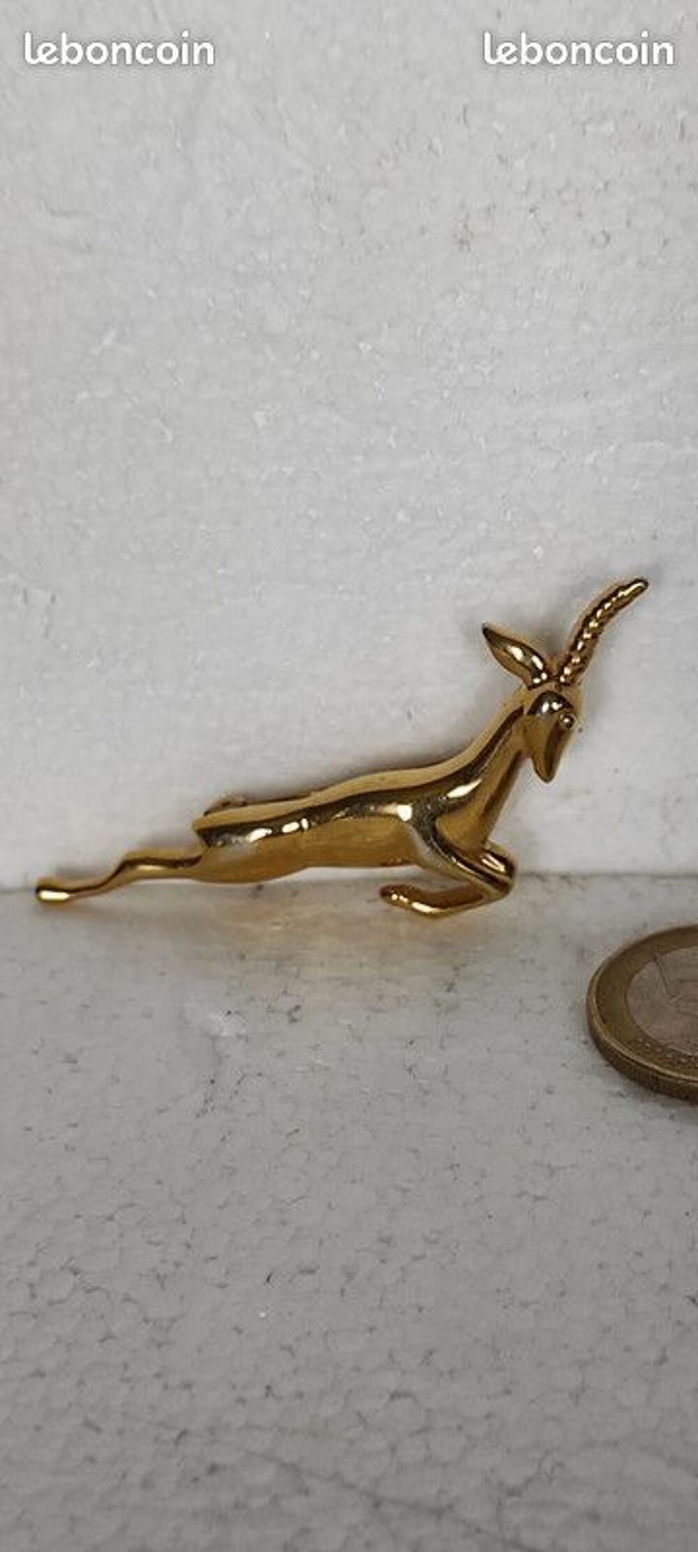 BROCHE ANTILOPE
COULEUR OR Bijoux et montres