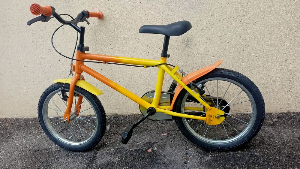 velo 16 pouces jaune orange 
Vélos