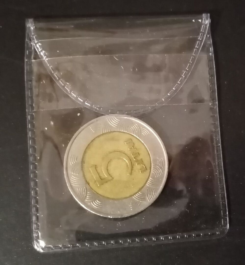 Tr&egrave;s belle pochette de protection pour monnaies 