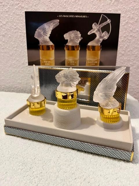 Miniatures parfum LALIQUE   les mascottes   originales 
90 Couzeix (87)