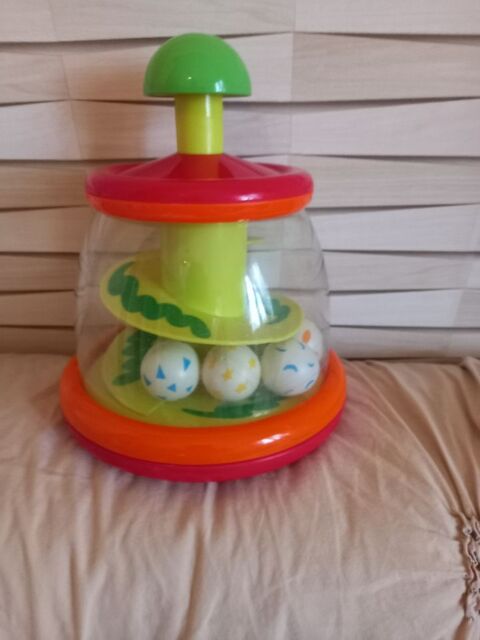 Toupie multicolore marque Tmimi 0 � 3 ans Villiers (86)