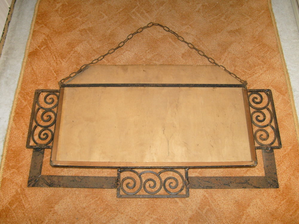 Ancien miroir bisot&eacute;, avec entourage en fer forg&eacute; Décoration
