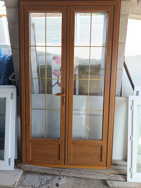 Liquidation porte d'ext�rieur � deux vantaux en alu 150 Montady (34)