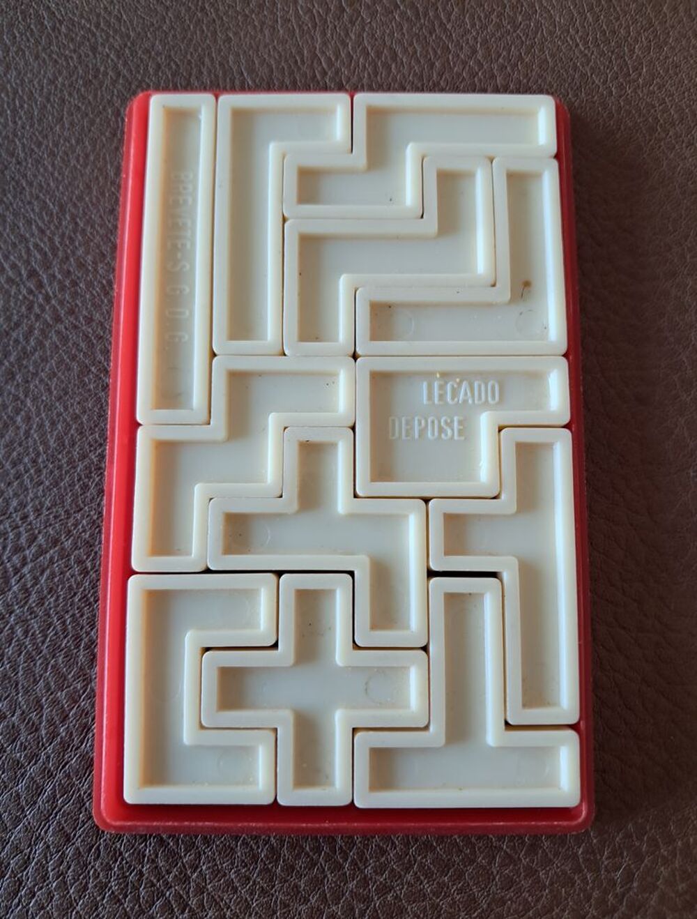 ancien casse t&ecirc;te vintage ann&eacute;es 60 70 en plastique tetris 