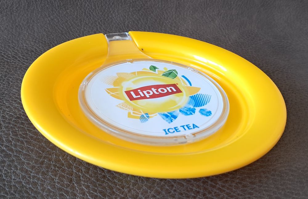 objet publicitaire ramasse monnaie de bar bistrot lipton 