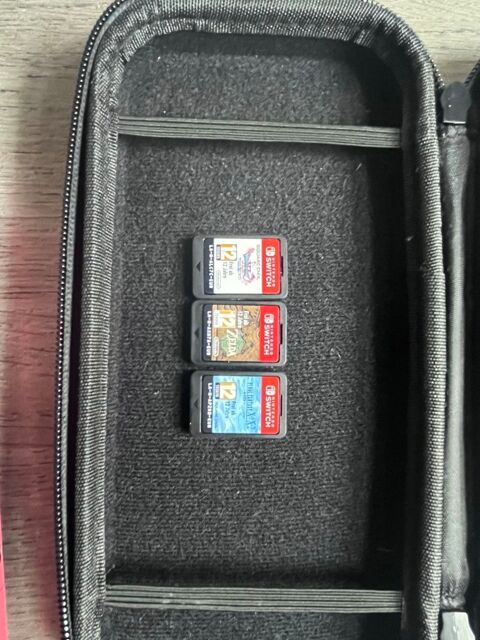Nintendo Switch Lite �  Tr�s bon �tat + Etui + Chargeur + 3 jeux d�mat�rialis�s Saint-Herblain (44)