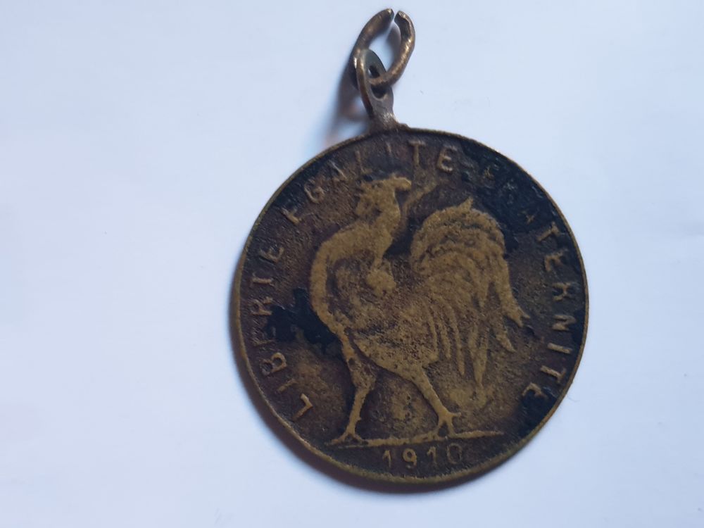 M&eacute;daille que ressemble a la pi&egrave;ce 20 francs Coq 