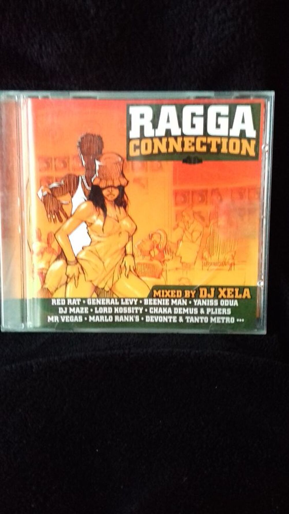 UN CD DE RAGGA MUSIC CD et vinyles