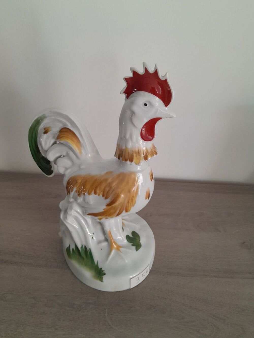 UN COQ EN PORCELAINE tel 0627473514 