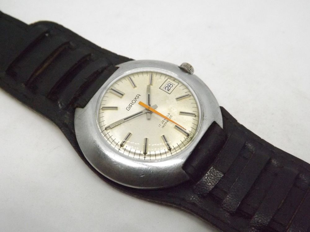 Tr&egrave;s belle montre suisse Giroxa ann&eacute;es 1970 'UFO' Bijoux et montres