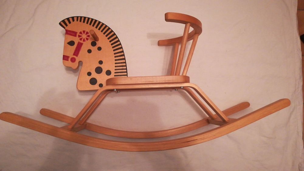 Prix cheval a bascule en bois store