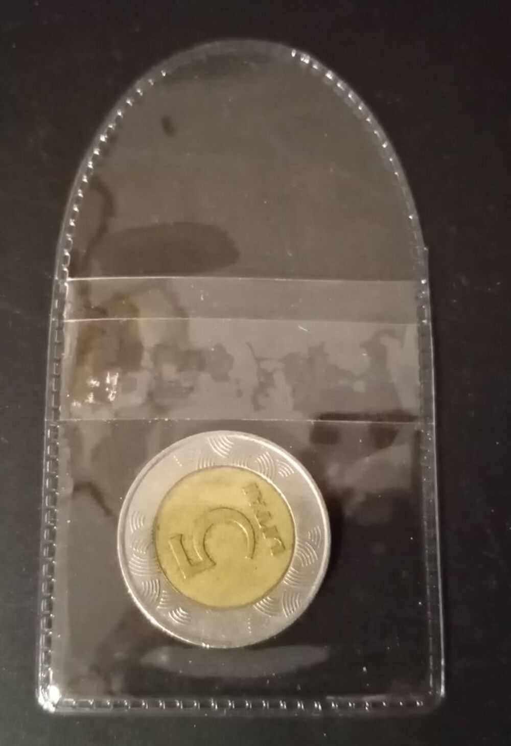 Tr&egrave;s belle pochette de protection pour monnaies 