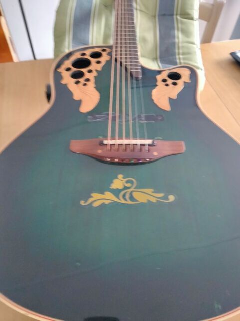 GUITARE OVATION ELites USA 
1100 Brech (56)