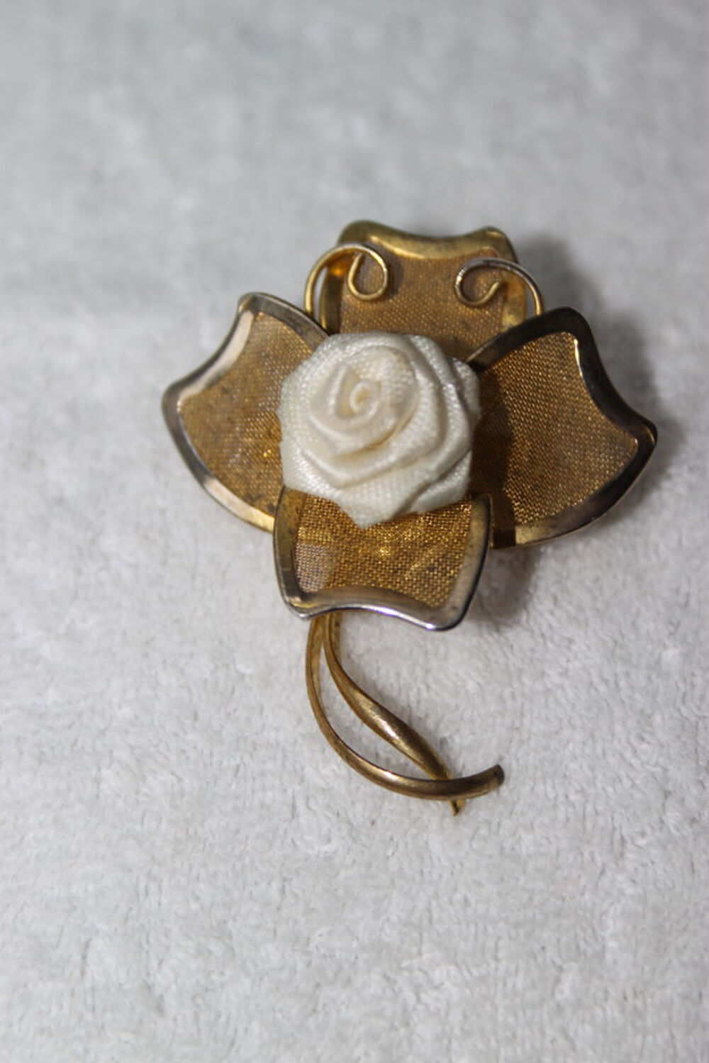 Broche plaqu&eacute; or
Bijoux et montres