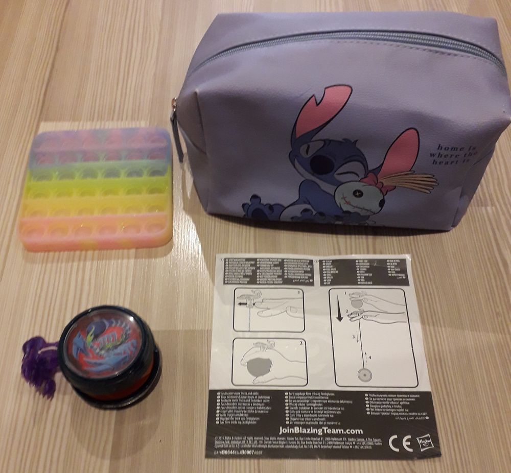 Trousse stitch Pop it yoyo blazing team gyrocombat scorpion Jeux / jouets