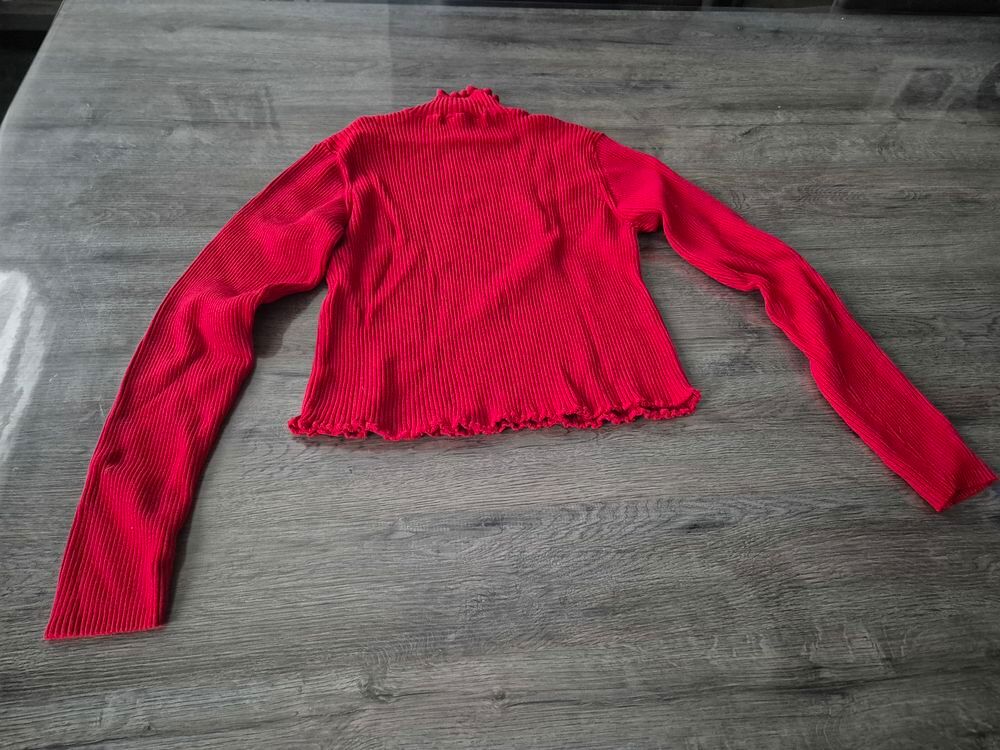 Pull col roul&eacute; court avec manche longue 
Vêtements