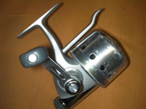 Moulinet capot� lancer DAIWA UNDERSPIN 120 35 Roques (31)