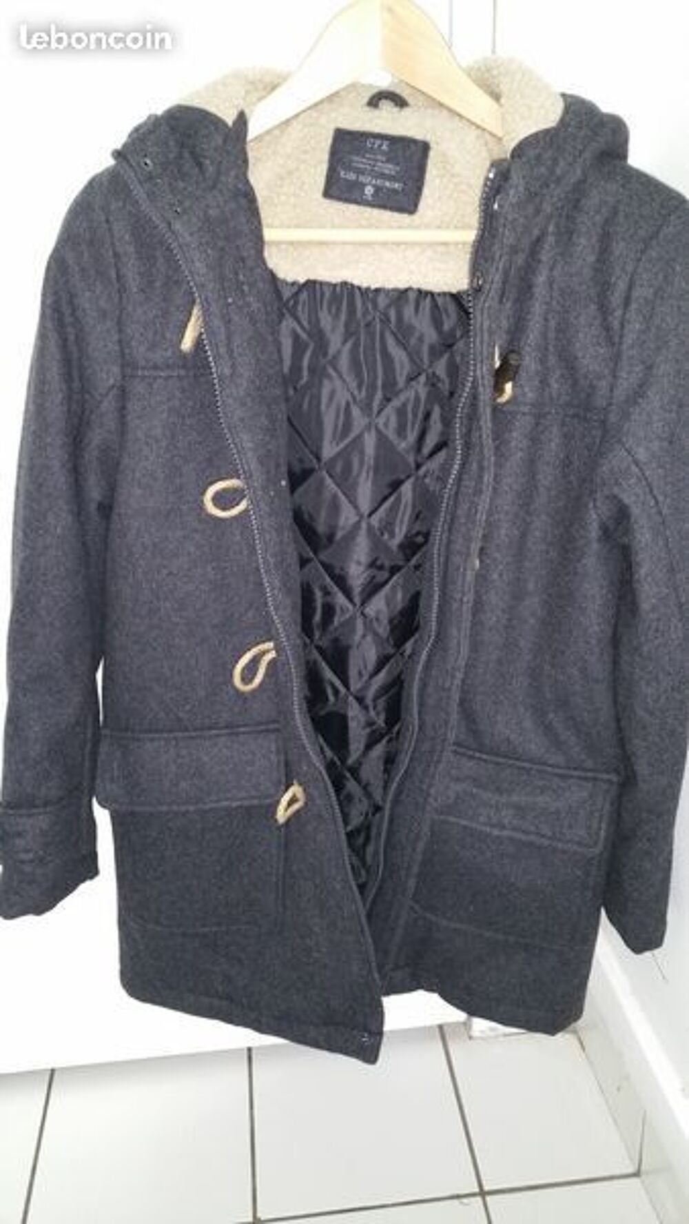 Manteau gris chin&eacute; Enfant CFK 12 ans. 
Jamais port&eacute;. Vêtements enfants