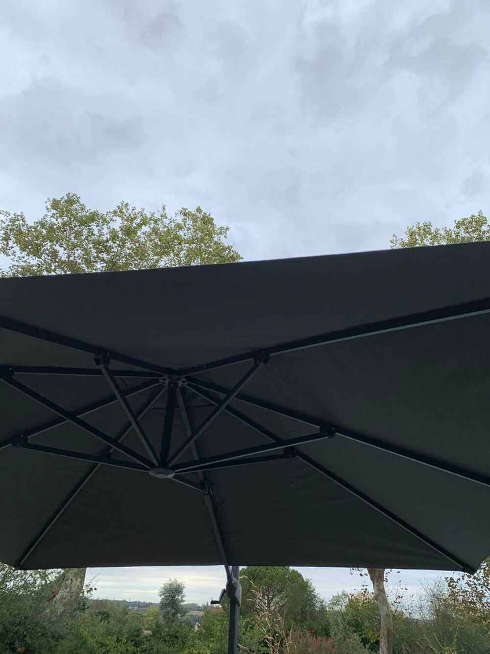 Parasol D&eacute;port&eacute; 3X3 +pied ciment +option roue Jardin