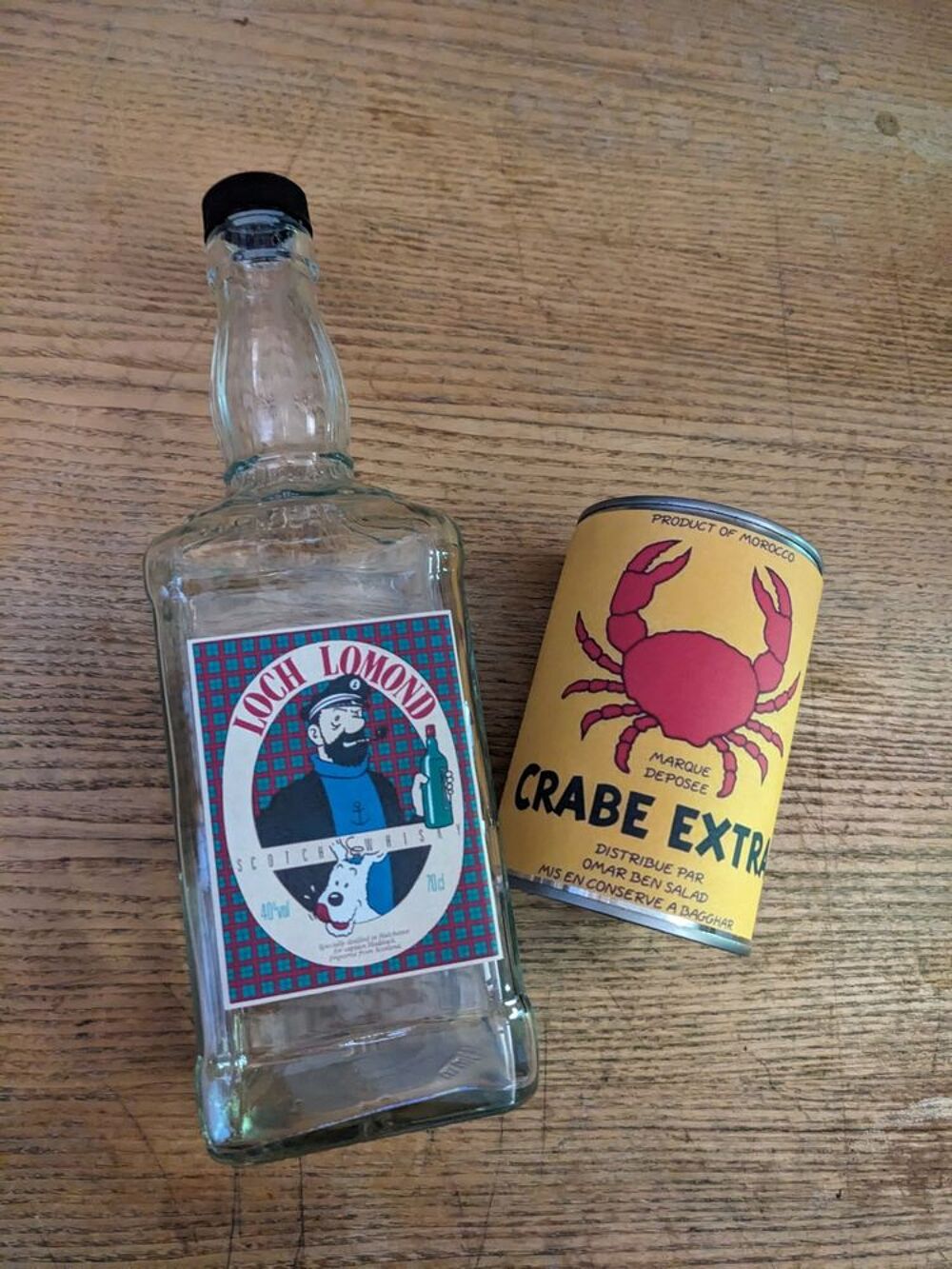 Bo&icirc;te de conserve Tintin + bouteille de whisky loch lomond d 