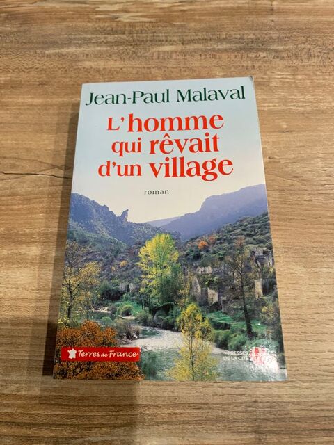 Livre roman      L' homme qui rêvait d' un vill 4 Saleilles (66)