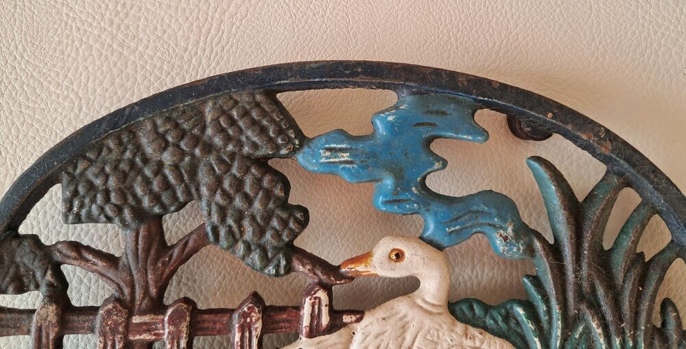 dessous de plat ovale et color&eacute; en fonte 2 oies Décoration