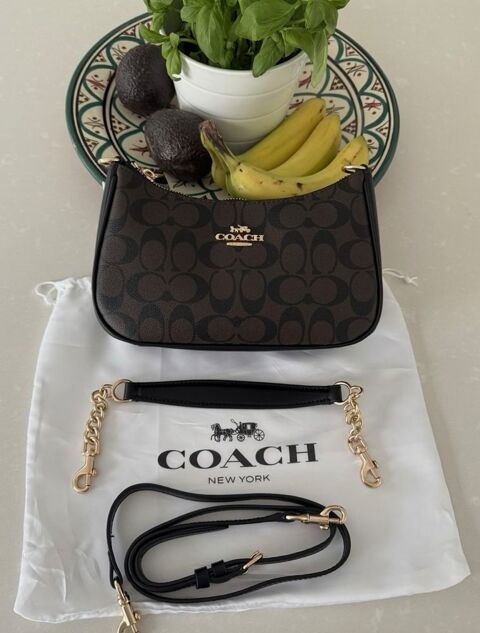 Sac baguette monogramme marron 
85 Paris 1 (75)