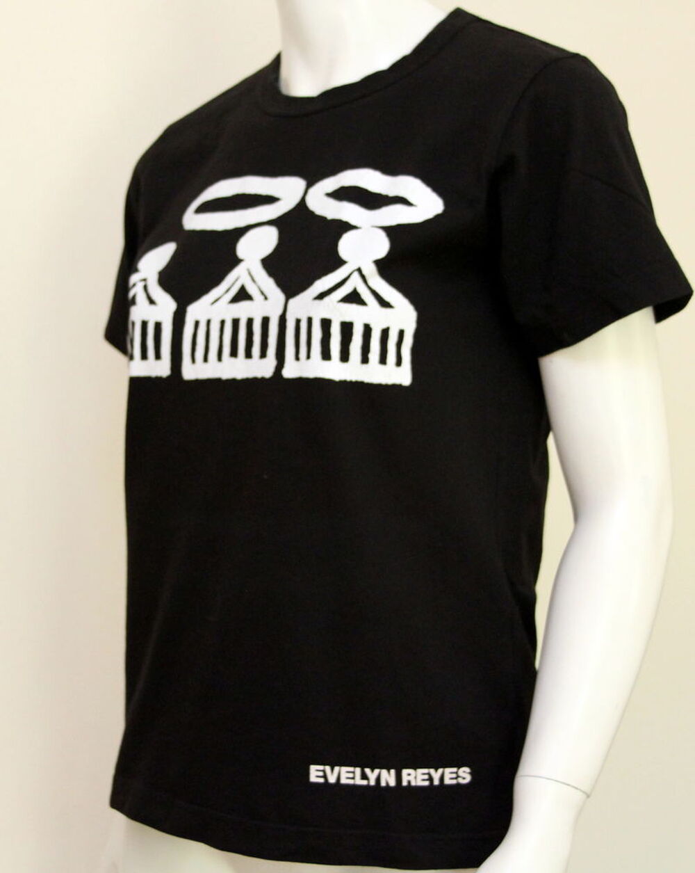 T-shirt noir COMME DES GARCONS x EVELYN REYES 
T.M ou 38/40 Vêtements