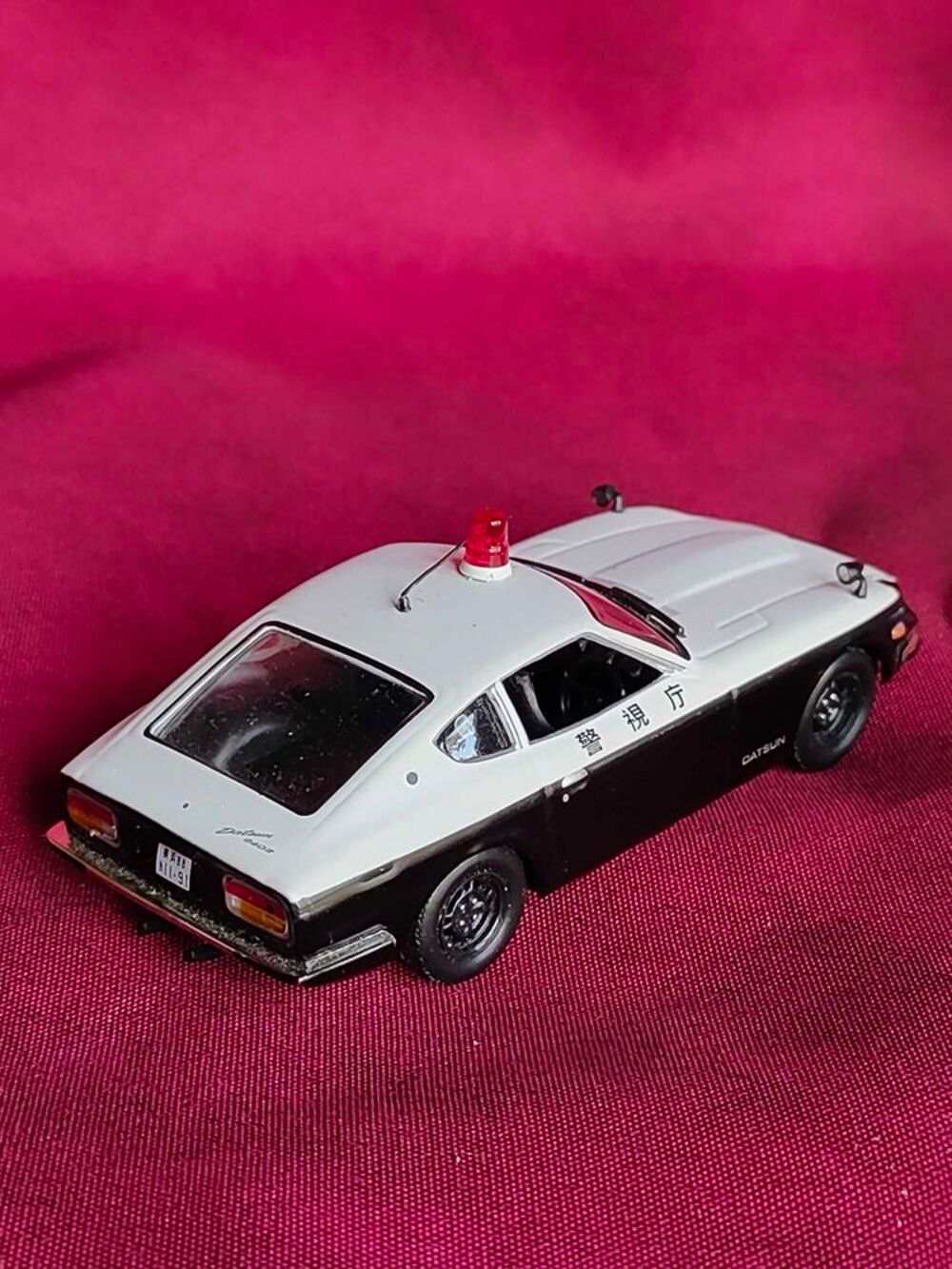 Voiture miniature datsun 240Z de la police 