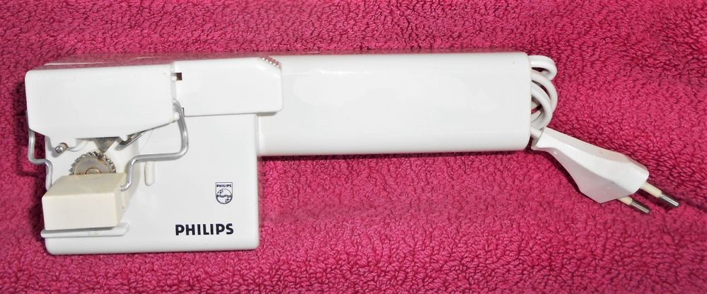 ouvre-bo&icirc;tes &eacute;lectrique PHILIPS et son range fil Electroménager