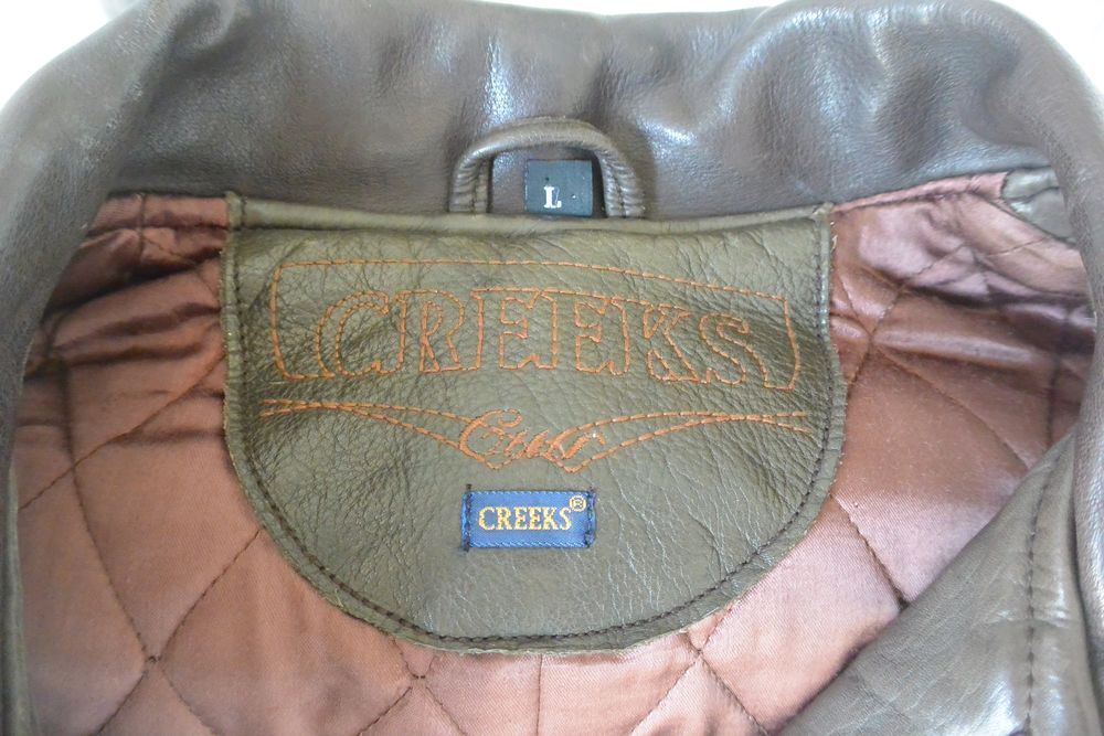 Blouson en cuir CREEKS - (Homme) Taille L vintage
Vêtements