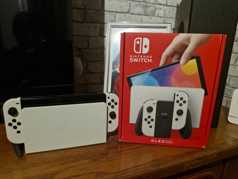  Switch oled Consoles et jeux vidéos