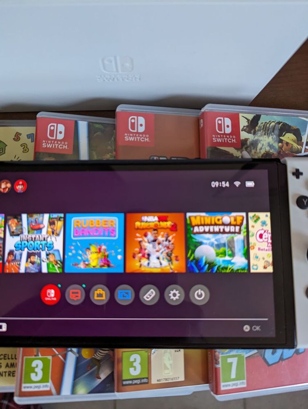 Nintendo Switch OLED + 11 jeux Consoles et jeux vidéos