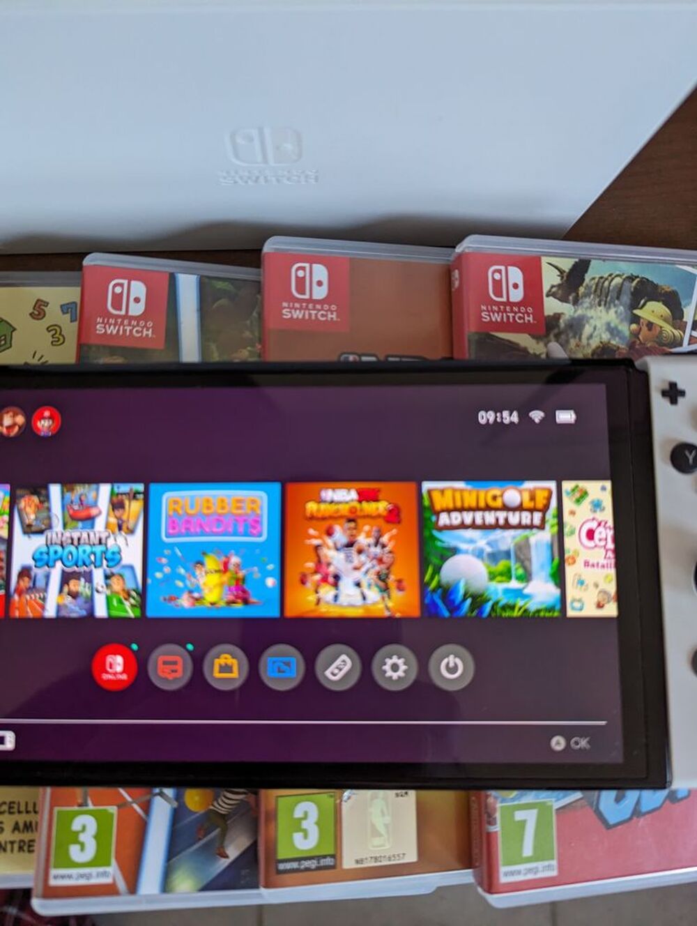 Nintendo Switch OLED + 11 jeux Consoles et jeux vidos