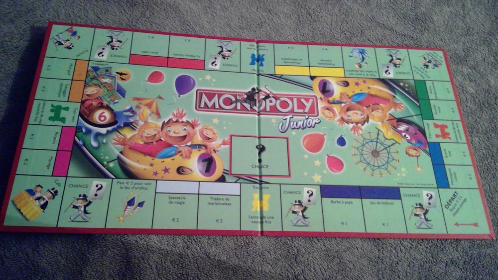 MONOPOLY JUNIOR
A LA FETE FORAINE
2 A 4 JOUEURS
5 A 8 ANS Jeux / jouets