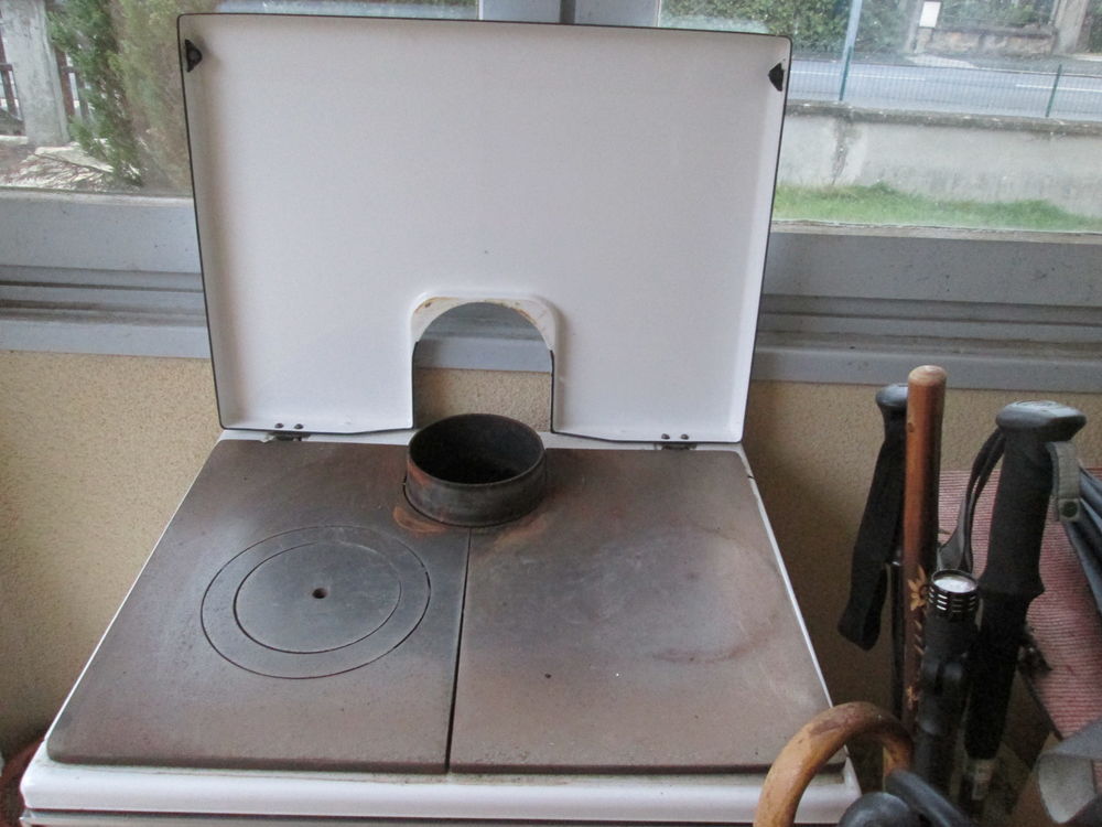 poele en fonte bois charbon Electroménager