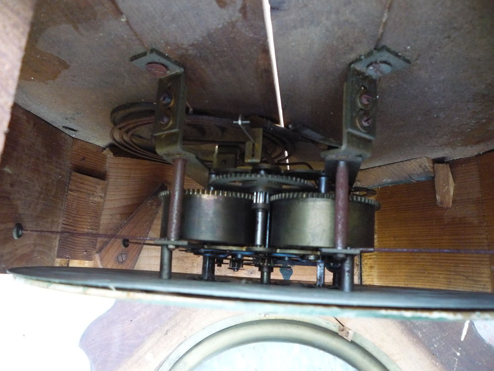 Oeil de boeuf / pendule (G) 